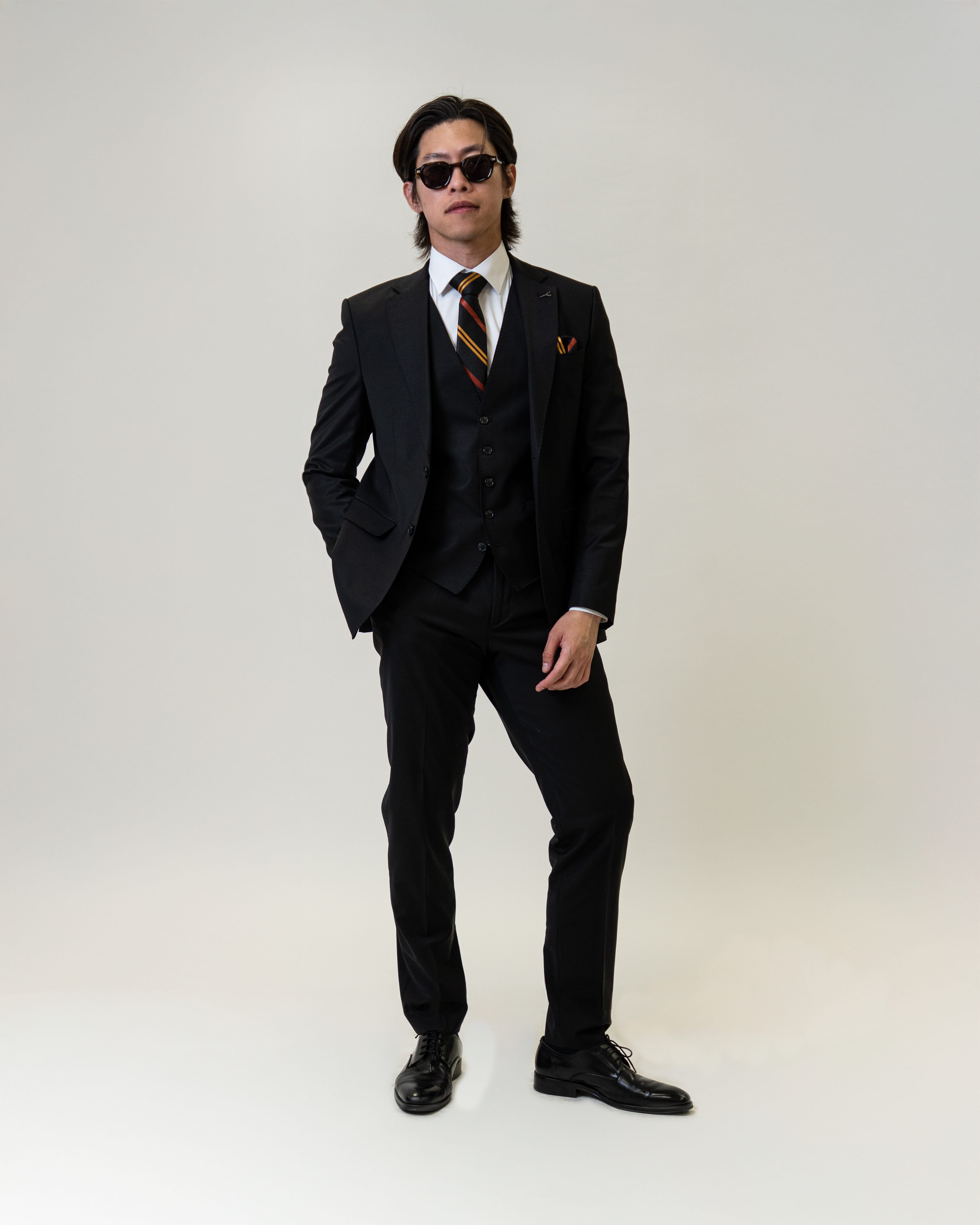 Black suit with sunglasses